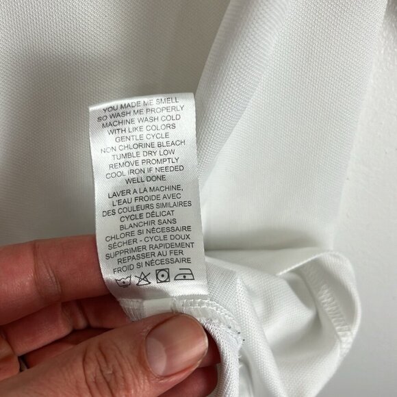 Travis Mathew White Polo Golf Shirt with Blue Front Stripe - Picture 7 of 9